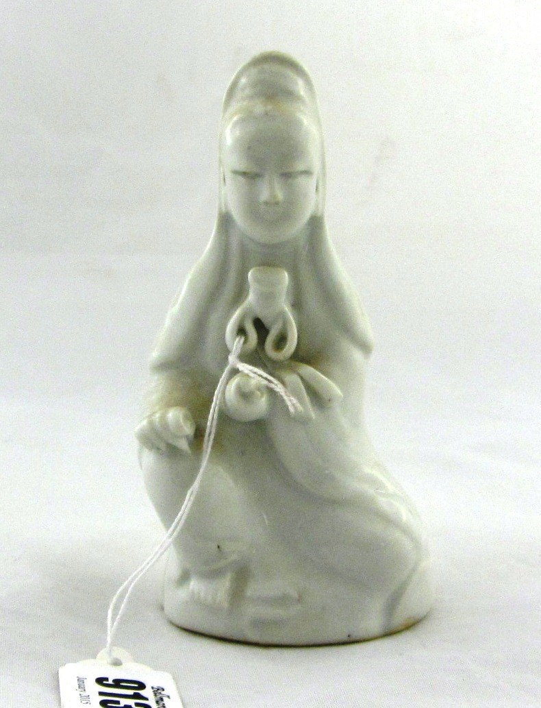 Appraisal: A Chinese porcelain white glazed figure of Guanyin th th