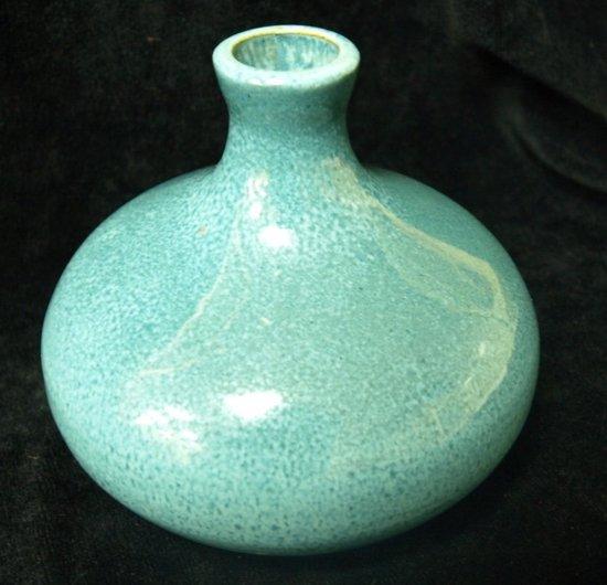 Appraisal: A blue squat vase of mottled glaze with slender neck