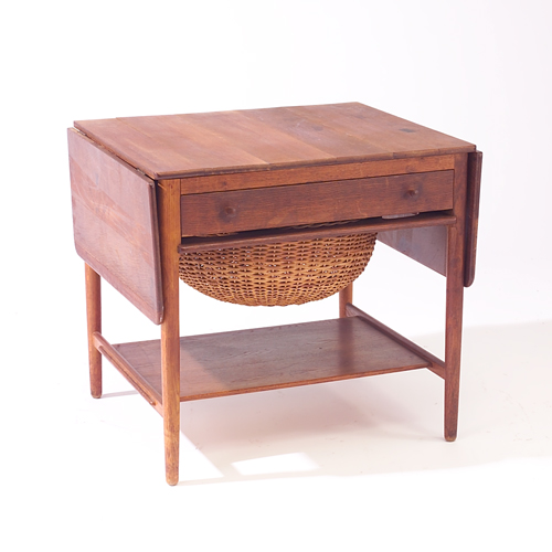 Appraisal: Hans Wegner sewing table with drop-leaf sides Wear and minor