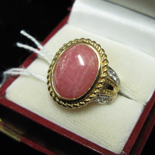 Appraisal: DESIGNER RHODOCHROSITE DIAMOND AND FOURTEEN KARAT GOLD RING set with