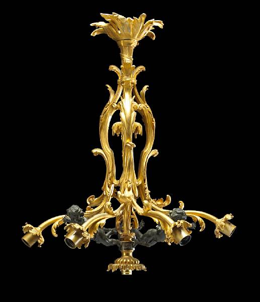 Appraisal: A Belle Epoque style patinated and gilt bronze seven light