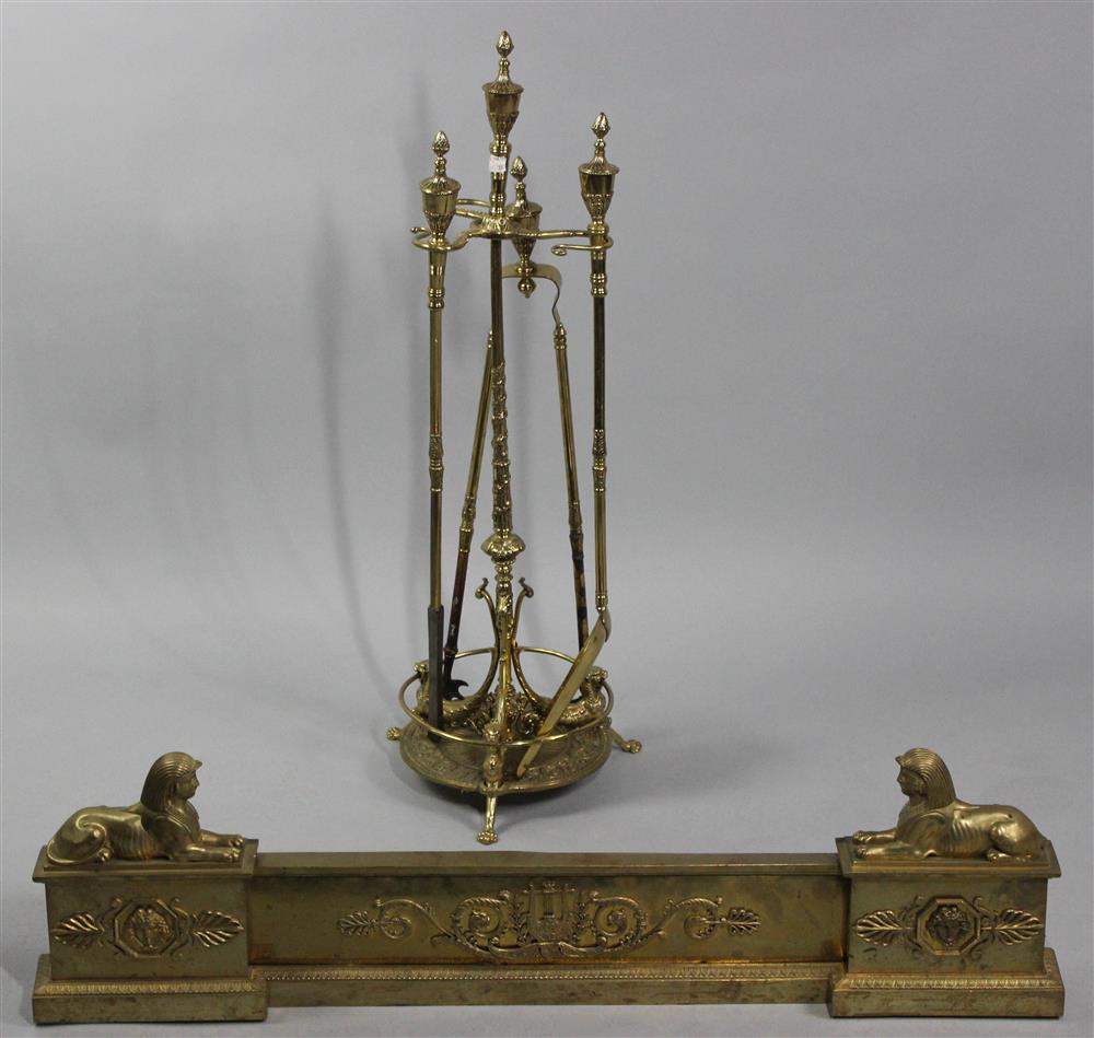 Appraisal: REGENCY BRASS FIRE FENDER WITH TH CENTURY BRASS FIREPLACE TOOLS