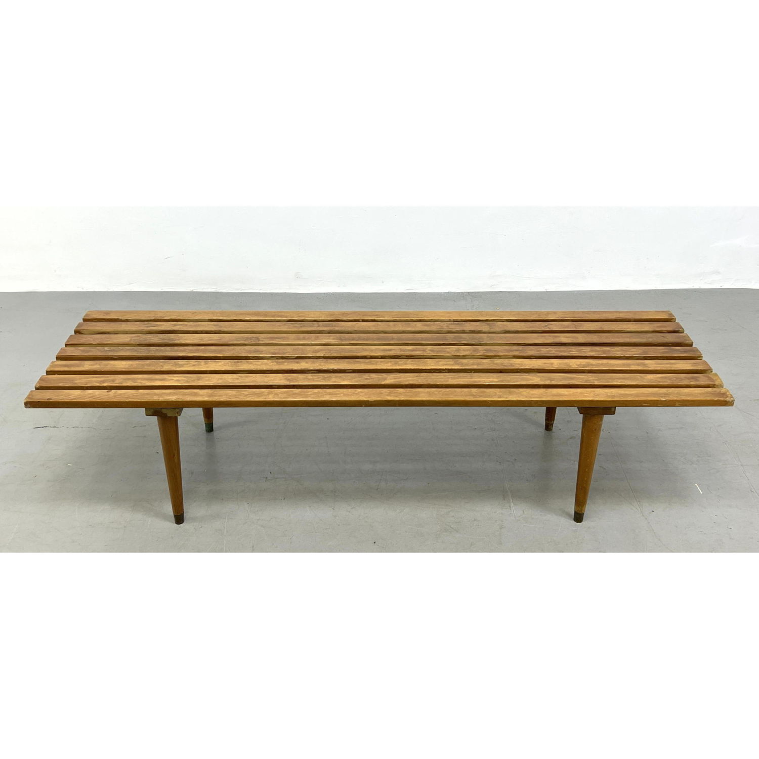 Appraisal: Modernist Slat Bench Tapered Wood Legs with metal caps Dimensions