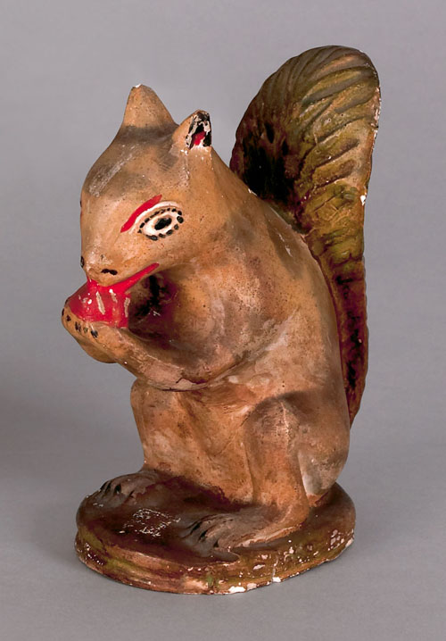 Appraisal: Chalkware squirrel th c retaining its original polychrome painted and