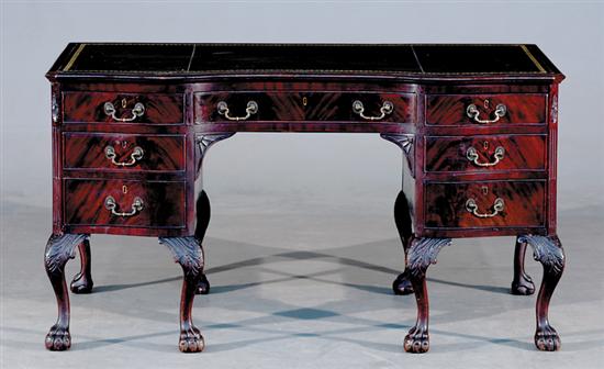 Appraisal: Irish Chippendale style mahogany serpentine desk Spillman of London first