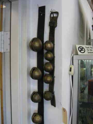 Appraisal: Victorian Strand of Sleigh Bells graduated on leather straps