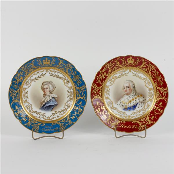 Appraisal: Pair of hand painted and gilt porcelain plates of Louis