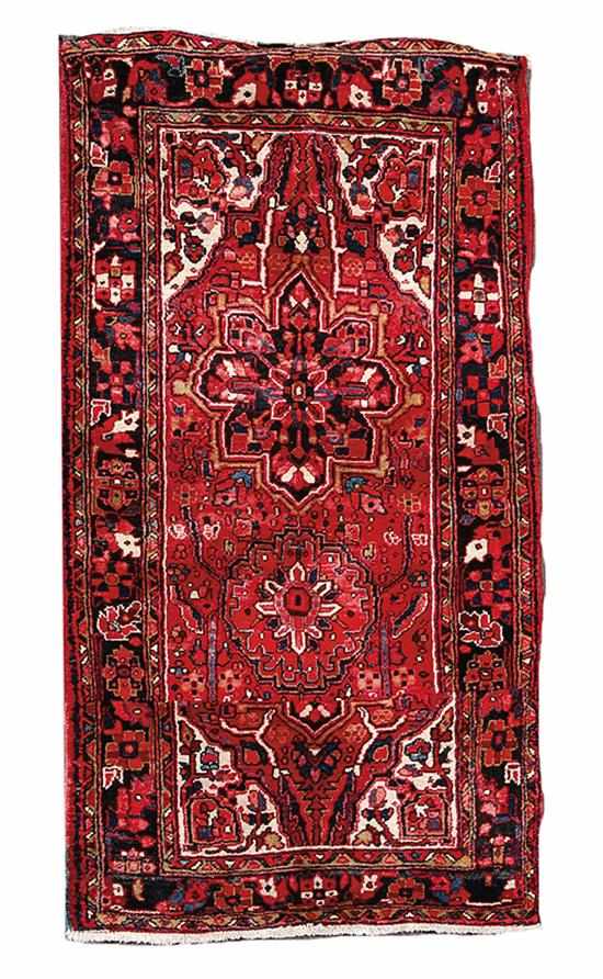 Appraisal: Persian Heriz carpet ' '' x ' '' rug has