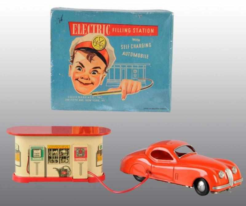 Appraisal: Tin Distler Automobile with Station Toy Description German Circa s