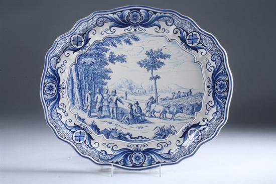 Appraisal: DUTCH DELFT PLATTER th- th century unmarked Shaped rectangular depicting