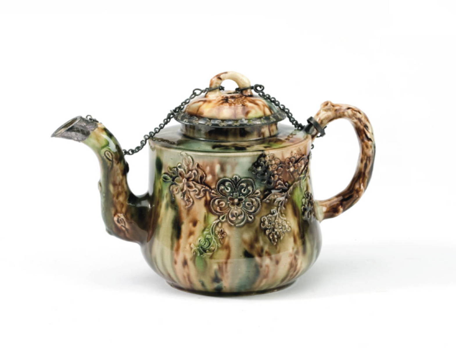 Appraisal: STAFFORDSHIRE CREAMWARE TORTOISESHELL-GLAZED MAKE-DO TEAPOT AND COVER CIRCA - Of