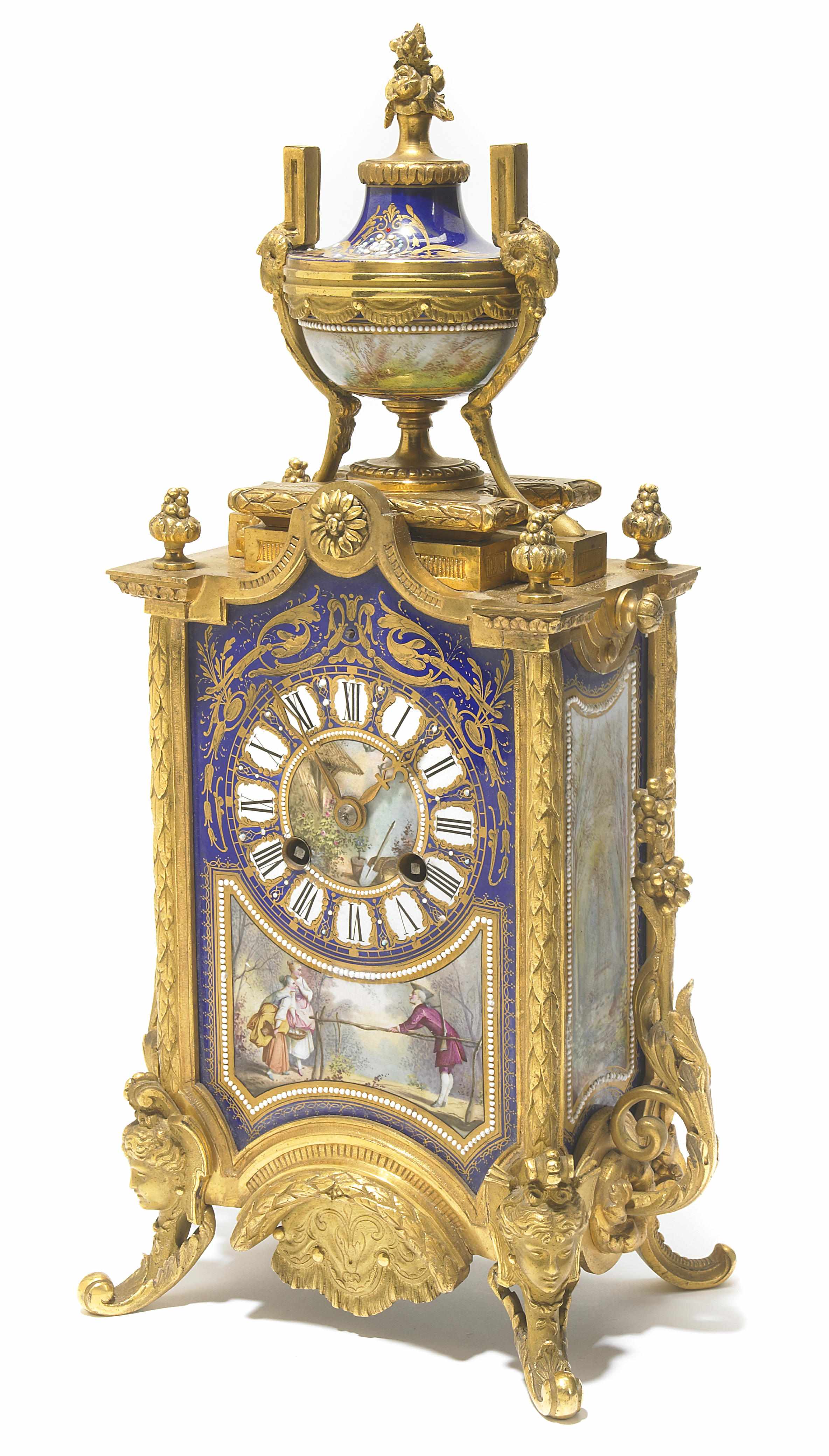 Appraisal: A French gilt bronze and earthenware mounted mantel clock late