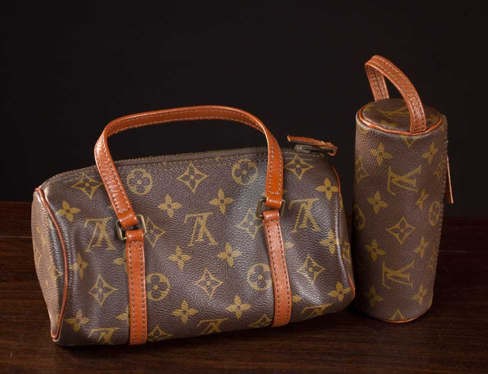 Appraisal: TWO LOUIS VUITTON ATTRIBUTED MONOGRAM BAGS the golf ball bag