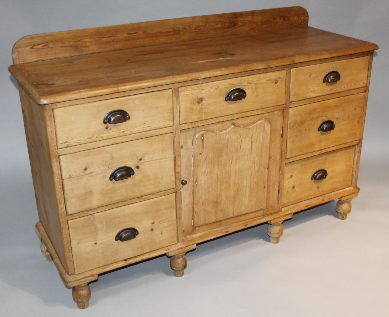 Appraisal: An early thC reclaimed pine side cabinet the moulded cornice