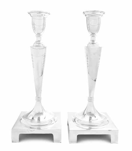 Appraisal: A Pair of Czechoslovakian Silver Candlesticks having an inverted bell