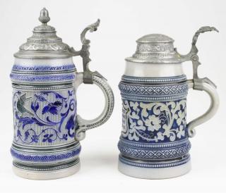 Appraisal: two early th c German blue white steins ht two