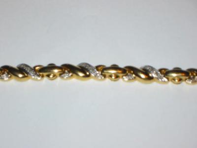 Appraisal: A DIAMOND CT GOLD BRACELET the fancy cross links inset