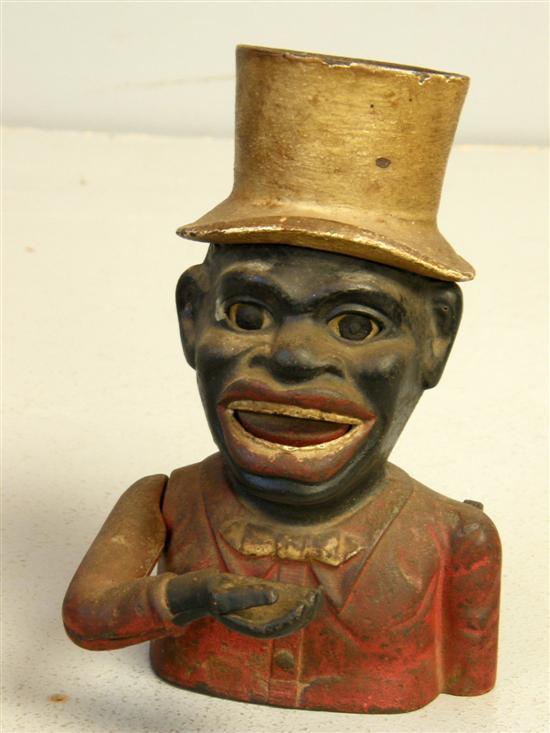 Appraisal: Cast Iron and painted Jolly Negro in top hat money