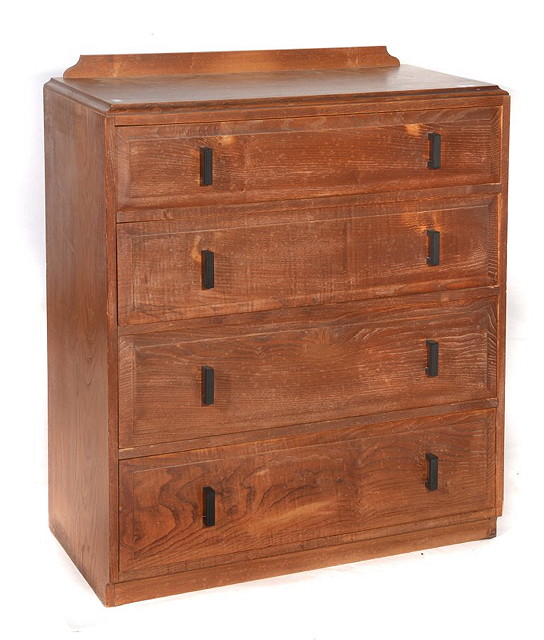 Appraisal: A COTSWOLDS CRAFTS STYLE OAK CHEST OF DRAWERS comprising four