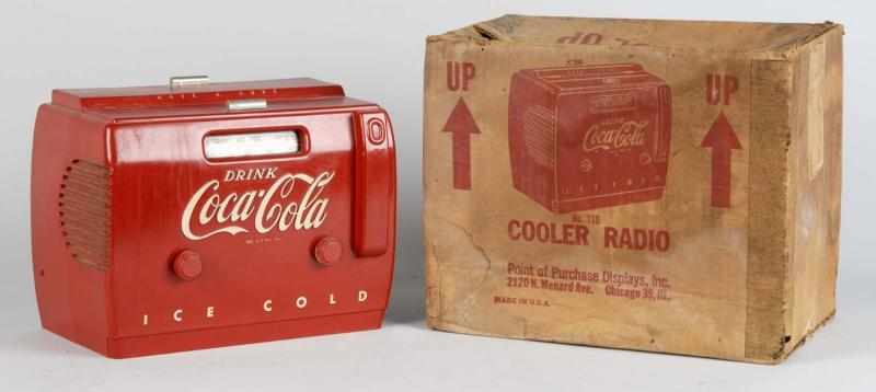 Appraisal: s Coca-Cola Cooler Radio with Box Description All original example