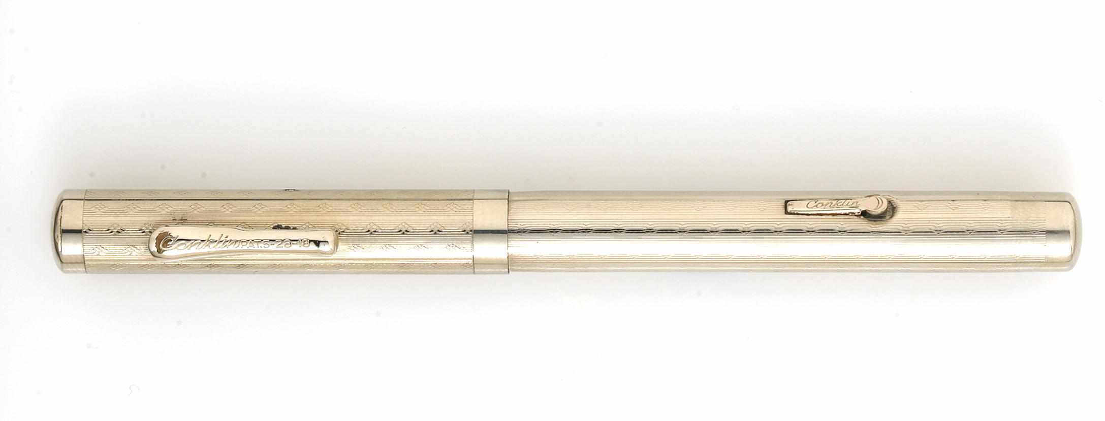 Appraisal: CONKLIN Fountain Pen Diamond and line silver guilloche overlay lever