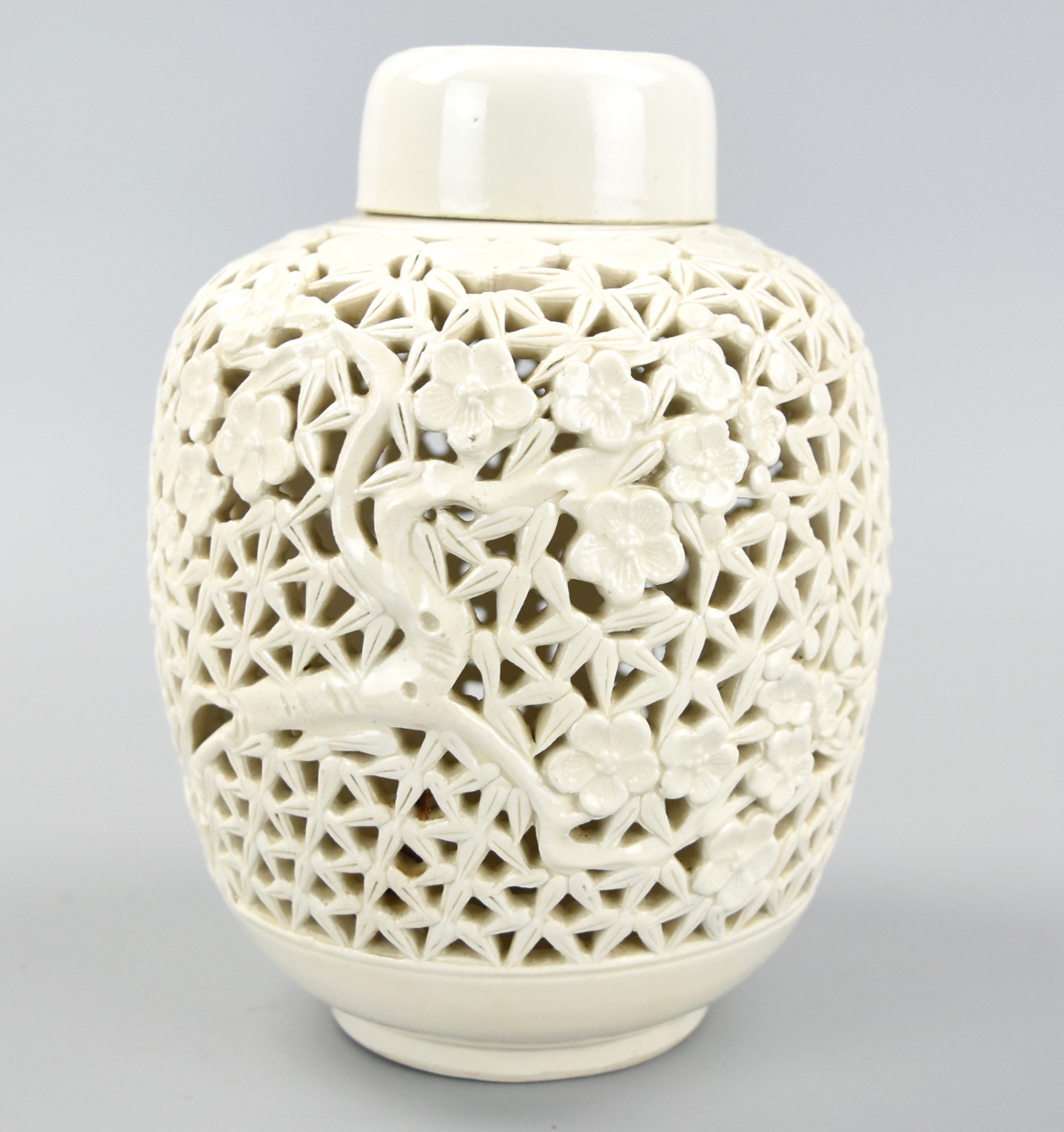 Appraisal: CHINESE WHITE GLAZED HOLLAW JAR AND COVER TH C A