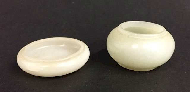 Appraisal: Chinese jade bowls th century A pair of small Chinese