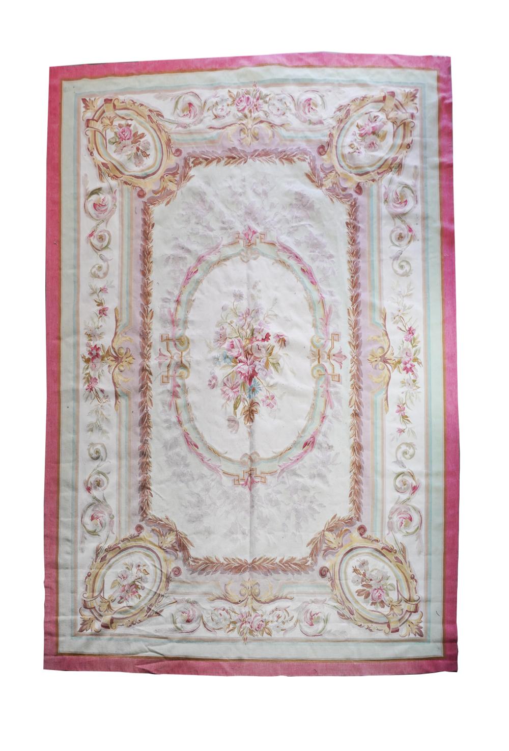 Appraisal: AUBUSSON WOOL RUG th century cream field within a pink