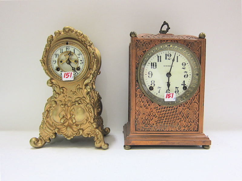 Appraisal: TWO AMERICAN METAL-CASED MANTEL CLOCKS Seth Thomas Duke model Waterbury