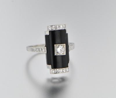 Appraisal: An Art Deco Platinum Diamond and Onyx Ring Platinum mounting