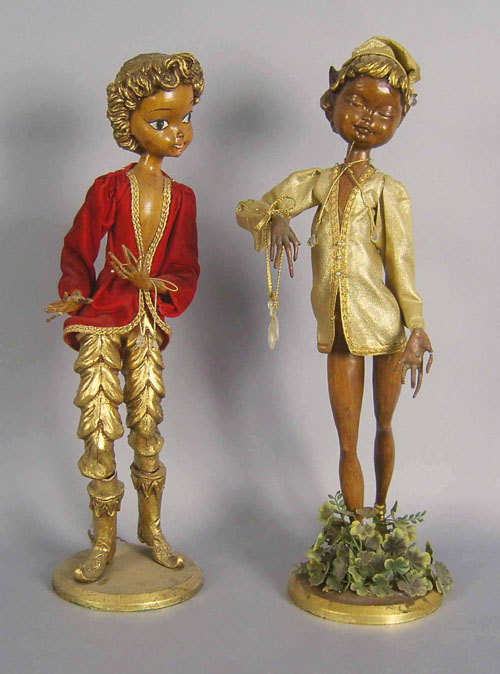 Appraisal: Pair of carved figures with gilt highlights h