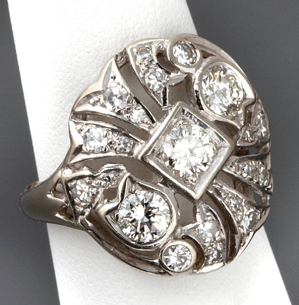 Appraisal: A diamond and k white gold filigree ring estimated total