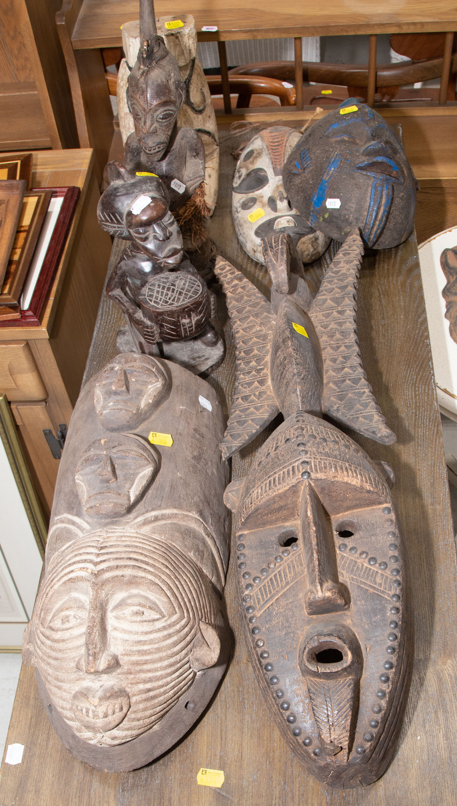 Appraisal: SEVEN PIECES OF AFRICAN ART Including a large Bambara mask