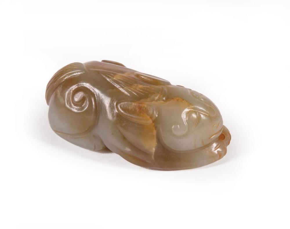 Appraisal: Chinese Celadon and Russet Jade Figure of a Recumbent Cat