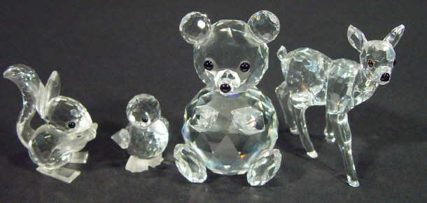 Appraisal: Four boxed Swarovski crystal animals - a teddy bear doe