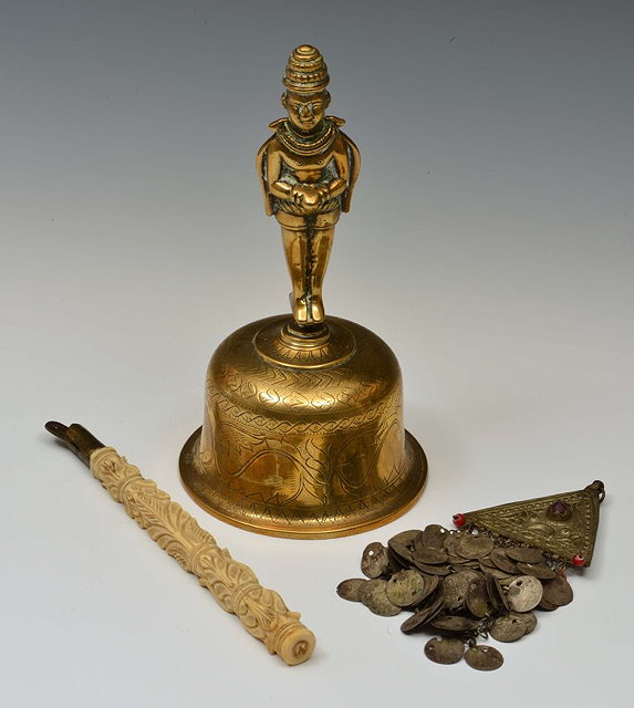 Appraisal: AN INDIAN ENGRAVED BRASS BELL an Indian pendant and a