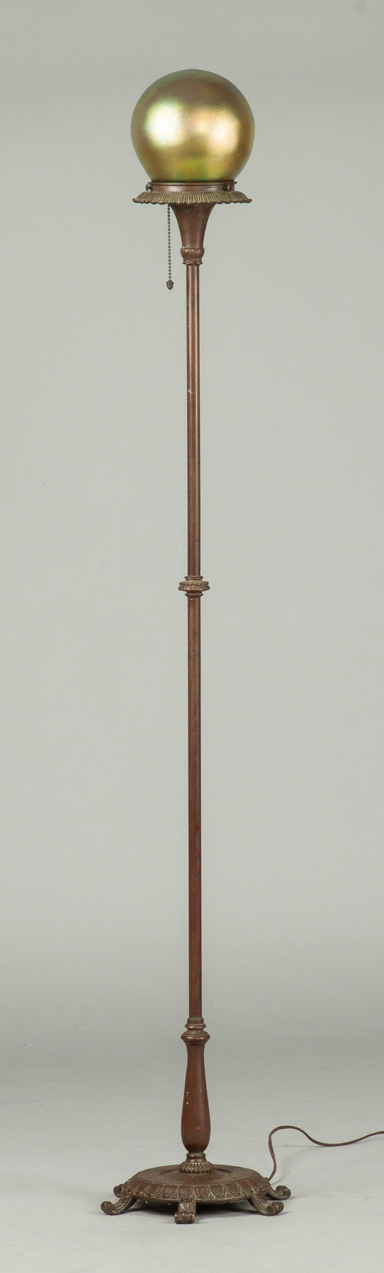 Appraisal: Bronze Floor Lamp with Gold Iridescent Shade Early th cent