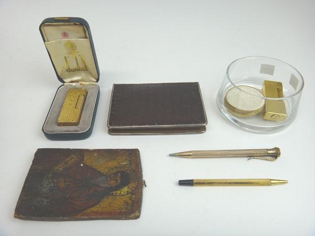 Appraisal: A gilt metal rectangular cased Dunhill gas lighter with a