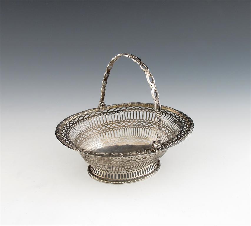 Appraisal: A silver swing-handled basket