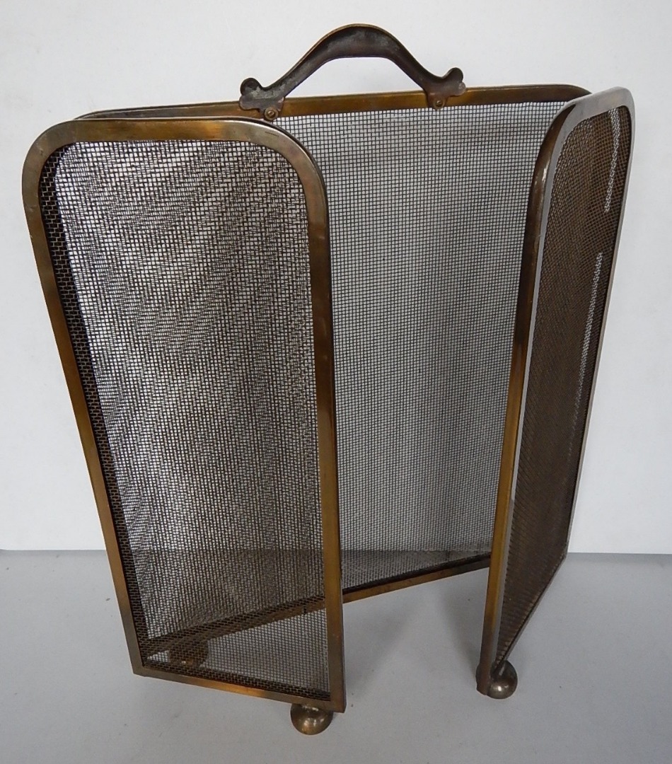 Appraisal: A brass folding spark guard