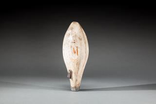 Appraisal: c A carved duck tail with a lead counterweight and