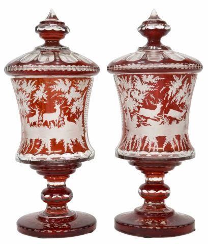 Appraisal: pair Bohemian ruby-stained glass covered vases late th c domed