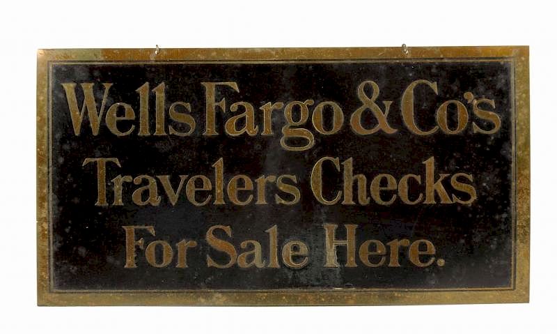 Appraisal: Wells Fargo Travelers Checks Brass Sign Signs retains its original