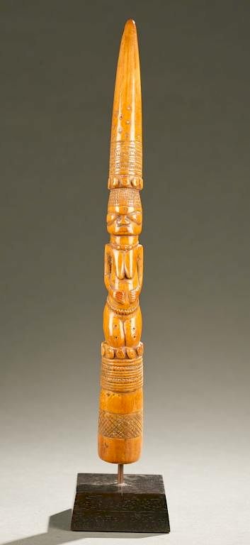 Appraisal: Yoruba ivory tapper th th c An ivory tapper with