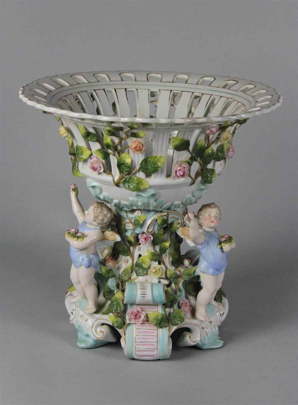 Appraisal: SITZENDORF PORCELAIN CENTERPIECE late th century blue underglaze mark formed