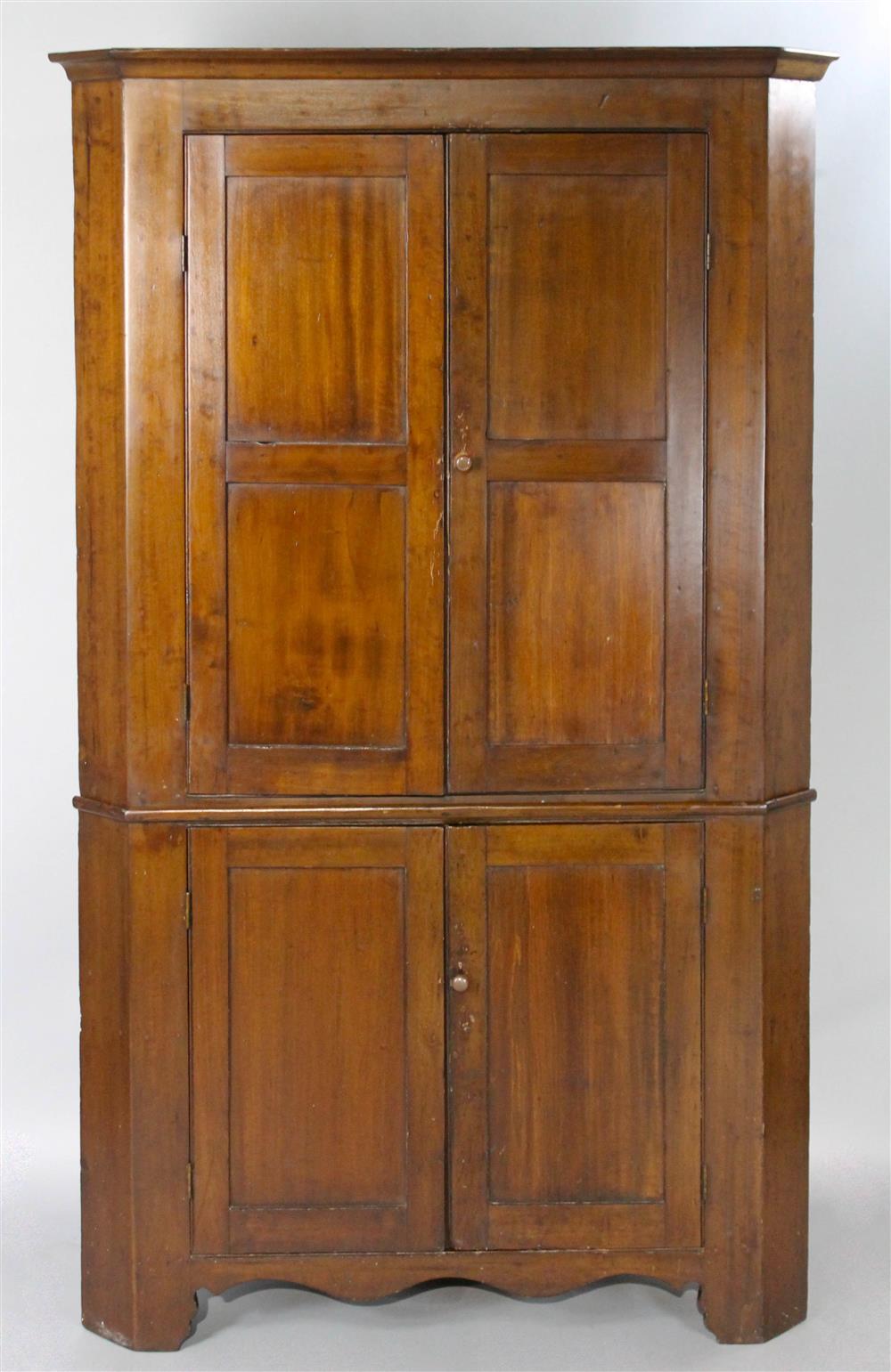 Appraisal: FEDERAL CHERRYWOOD PANELED DOOR CORNER CUPBOARD ca in two parts