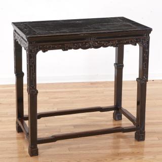 Appraisal: Chinese carved and lacquered hardwood table Chinese carved and lacquered