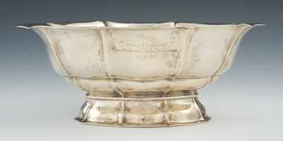 Appraisal: A Silver Presentation Bowl The boat shape pedestal bowl on