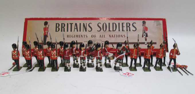 Appraisal: THREE SETS OF TOY SOLDIERS twenty-three pieces box of Britains