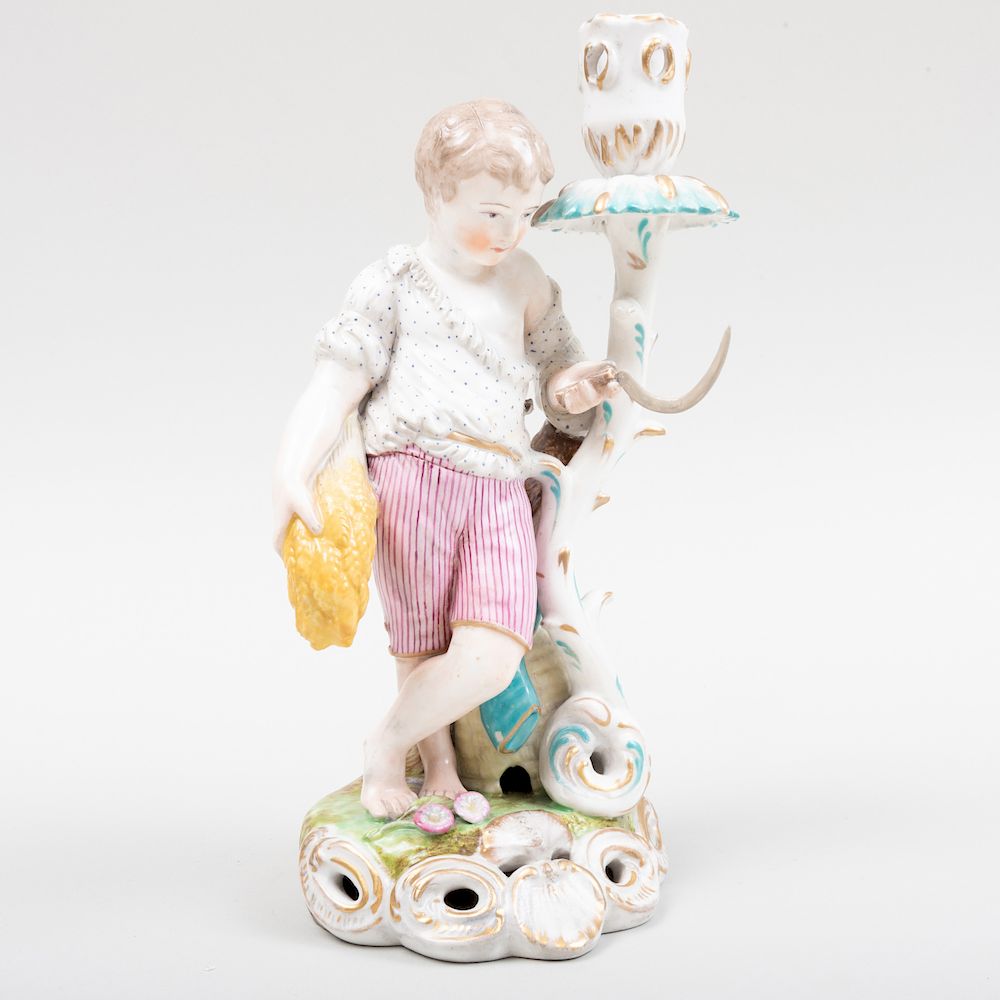 Appraisal: Stevenson Hancock Derby Porcelain Figural Candlestick Emblematic of Summer Blue